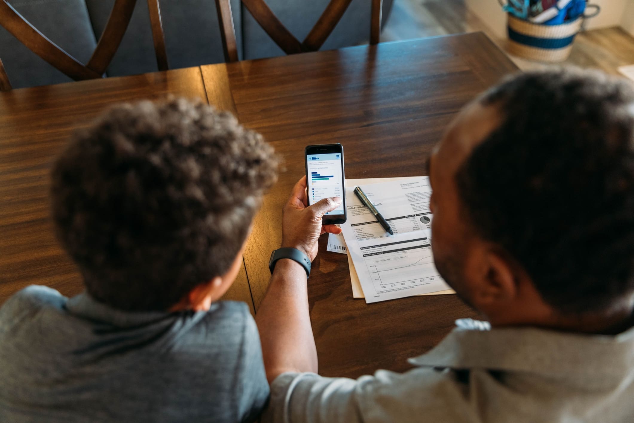 Father Teaching Son Home Finances stock photo